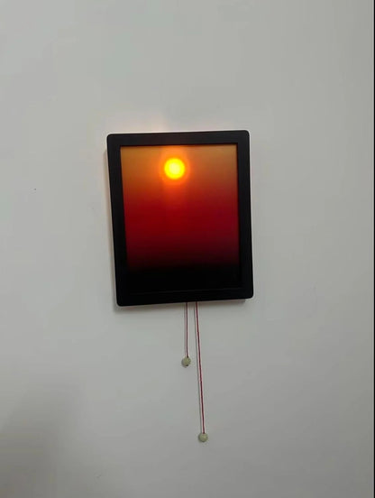 Kinetic Sunrise Wall Light